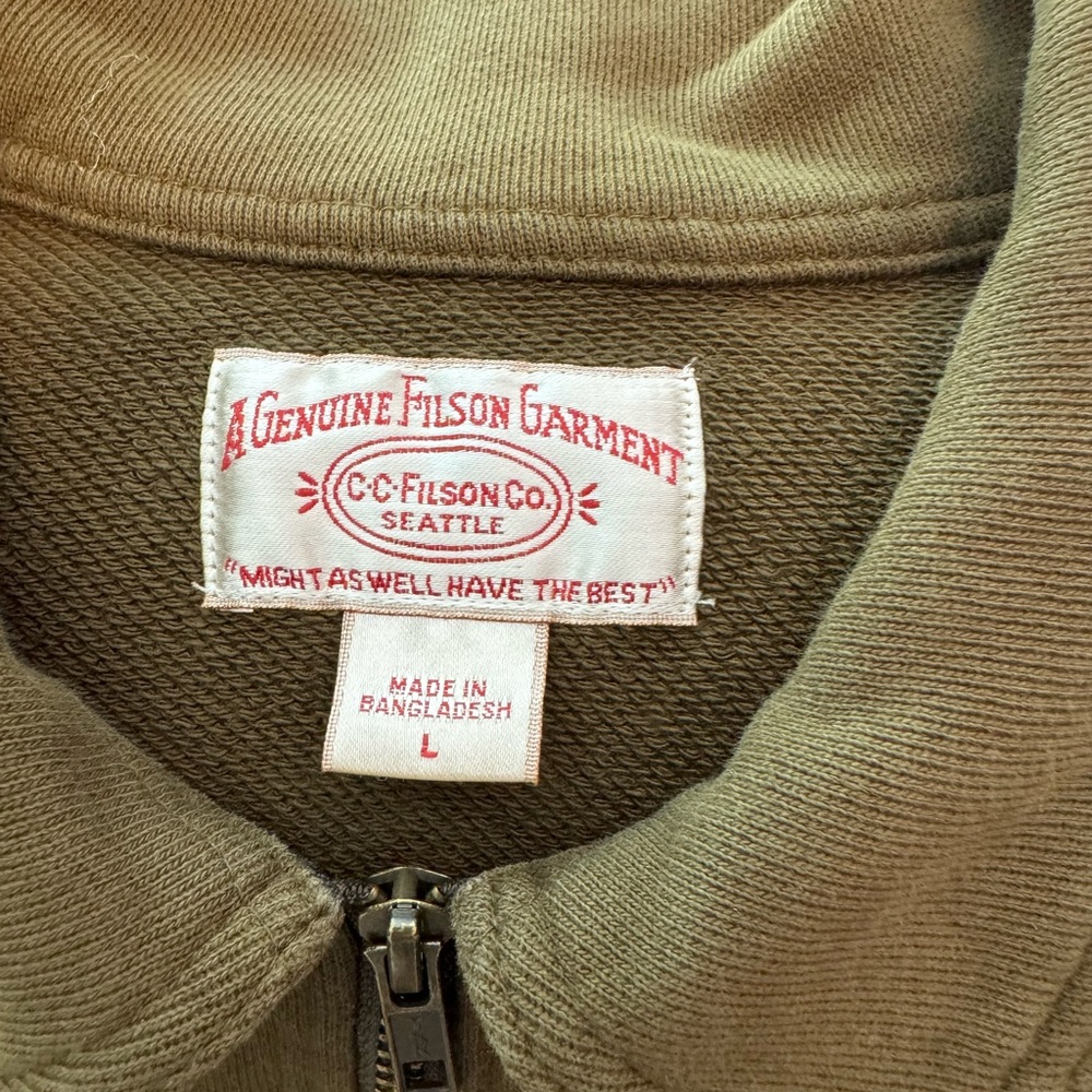 Filson 1/4 zip in front.  Worn once bought in NE Filson shop.